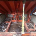 Mechanical dock leveler pit before hydraulic conversion