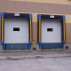 Commercial Sectional Overhead Door with Window and Dock Seals Installation in BC
